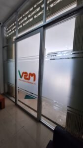 Sticker Sandblast custom logo MSV PT. Margreeta Sweeta Varia pada kaca pintu geser kantor di Bali