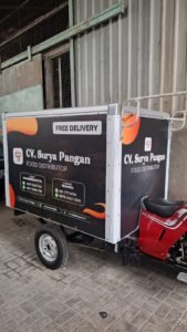 Sticker Print custom branding CV. Surya Pangan pada boks motor roda tiga di Bali