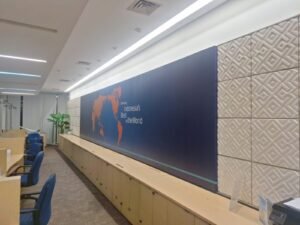 Sticker Print wallpaper peta dunia branding korporat "Delivering Indonesia's Best to the World" di dinding kantor Bali