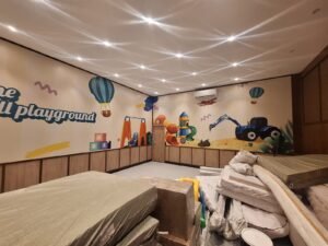 Sticker Print wallpaper mural ilustrasi perosotan dan alat berat anak di ruang bermain Shuka Grill Playground Bali