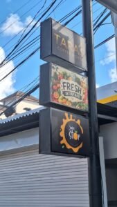 Sticker print Taras Coffee and Grill Ayu Nadi Fresh dan Juice Stop pada neon box
