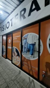 Sticker print promosi Physiotherapy Services pada kaca depan klinik fisioterapi Mengwi